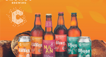 Image of 3 bottles and 2 cans of beer made by sustainable craft brewery, Crumbs Brewing. Bottles and can are on a flat surface against an orange background with loaves of bread behind them